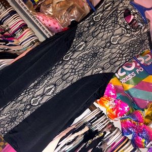 Black lace dress shirt. Sleeveless.